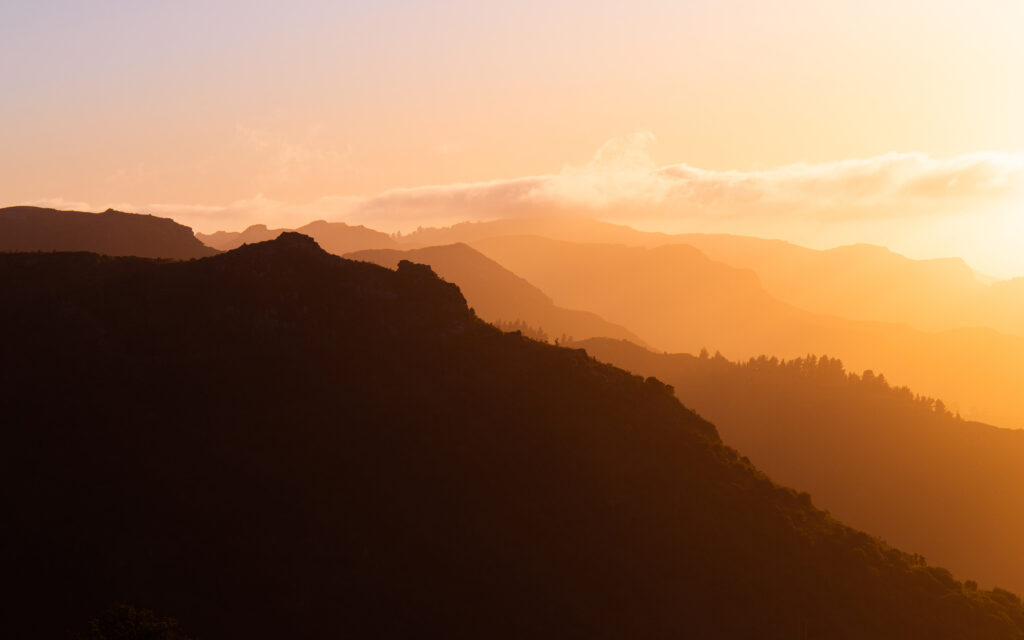 Sunrise view of mountain layers.